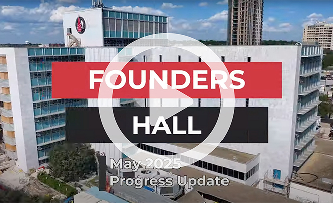 Image of Founders Hall with video playbutton