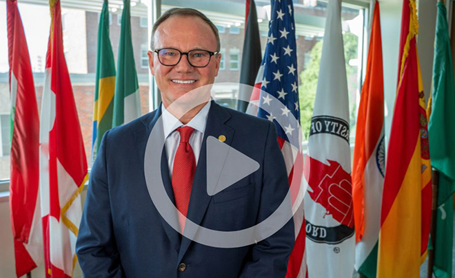 President Evans with international flags