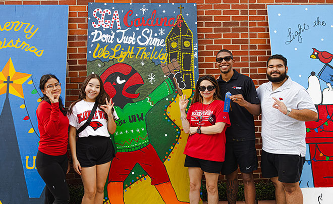SGA members with display board
