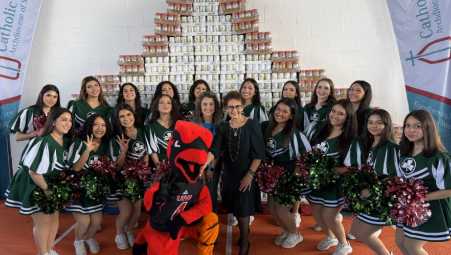 Red the Cardinal and attending students