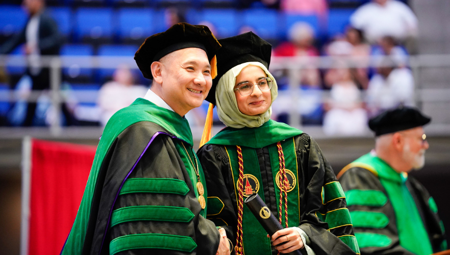 Graduate with Dean Pham