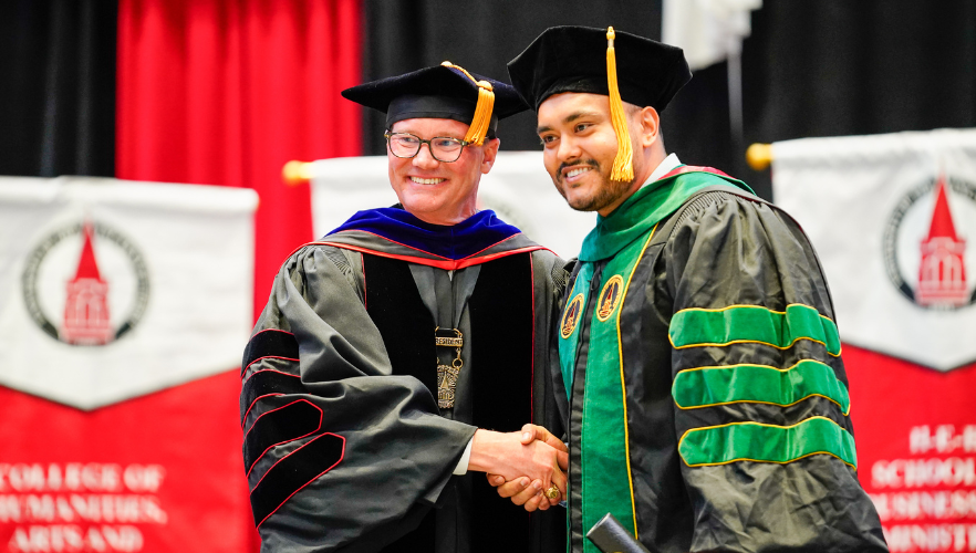 Graduate with Dr. Evans