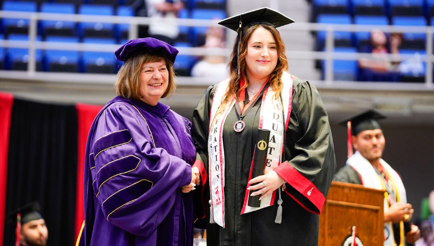 Graduate with Dean Wojnar