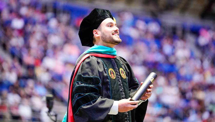 Graduate smiling