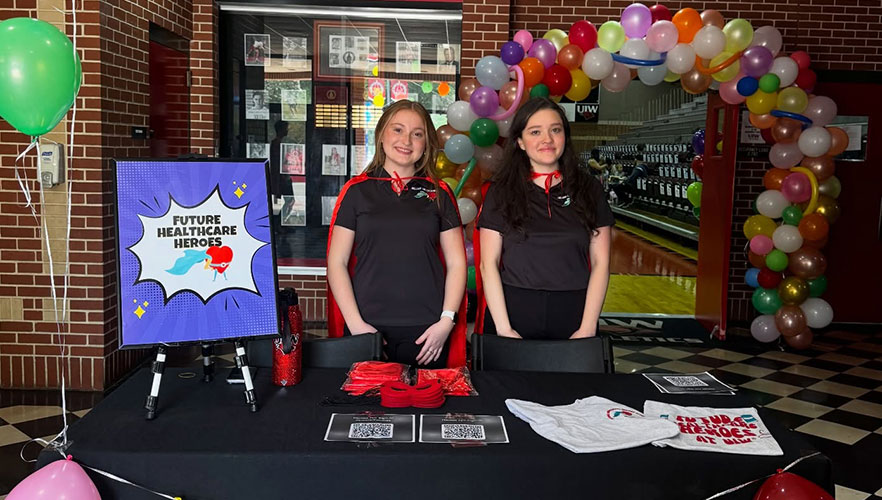 Students at Sign In Table