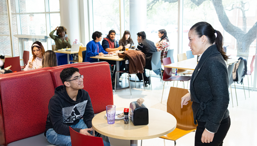 Mayor Gina Ortiz Jones taking with UIW student in cafeteria
